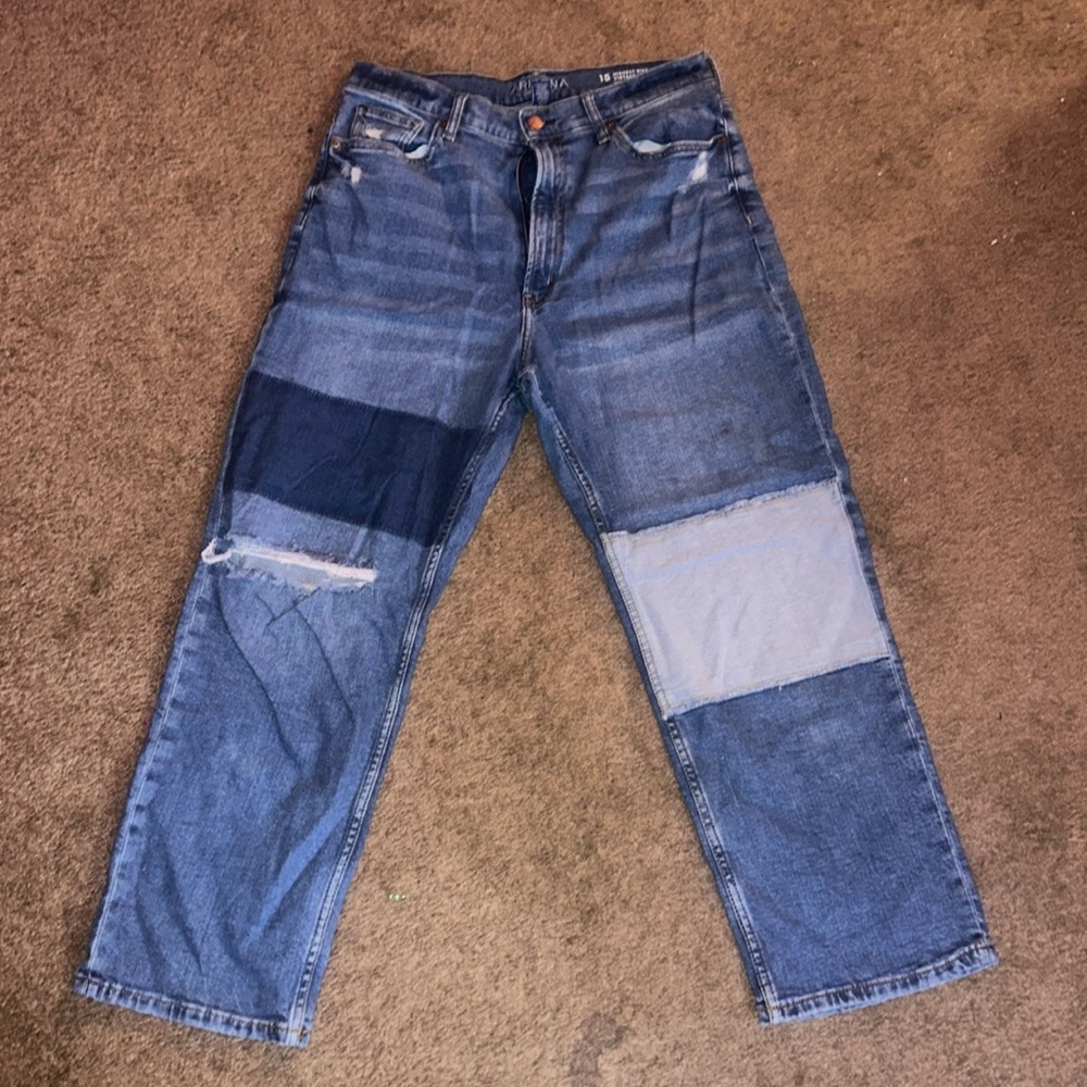 Blue patched mom jeans with rips
